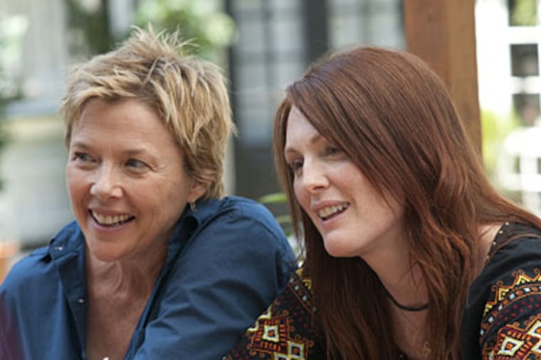 The moms: Annette Bening (left) and Julianne Moore as Nic and Jules, two lesbian mothers involved in a stable relationship who have children fathered by the same sperm donor.