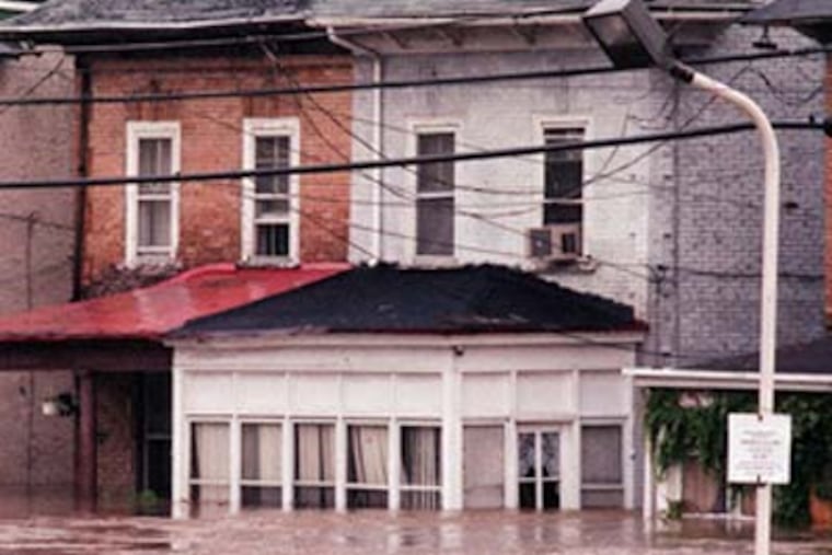 The few inches of rain expected this weekend could be historic for winter, but the all-time mark - 6.63 inches - was set by what was left of Hurricane Floyd on Sept. 16, 1999. (Charles Fox / Staff Photographer)