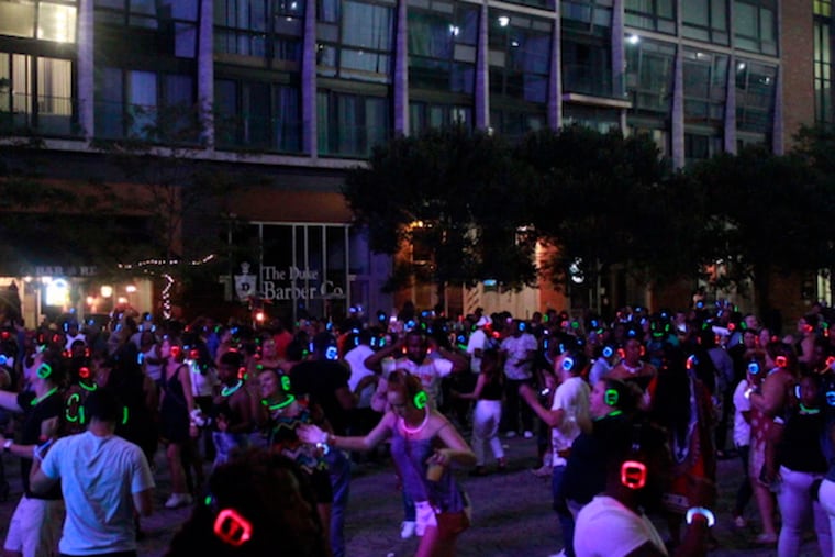 A Silent Philly at Schmidt's Piazza. Each partygoer gets headphones and a choice of tunes.