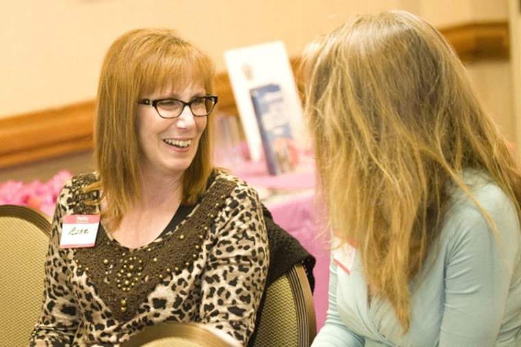 Rose Clime, left, and Sharon Butler chat on March 18, 2014, at a Lady Landlords of America meeting in Dana Point, Calif. Similar events, typically held once a month, attract a variety of professionals, including accountants, tax lawyers, real estate agents and a mix of old-time and newbie property investors, flippers and landlords alike. (Rod Veal/Orange County Register/MCT)
