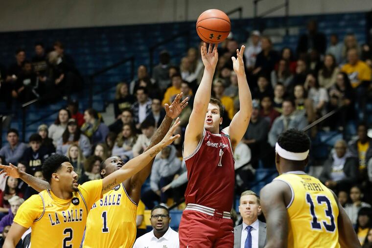 Saint Joseph's guard Ryan Daly takes a shot during the Hawks' recent game at La Salle.
