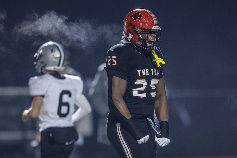 Imhotep Charter's Jahsear Whittington celebrating a tackle against Strath Haven during PIAA semifinals on Dec. 1. Whittington is committed to Pittsburgh.