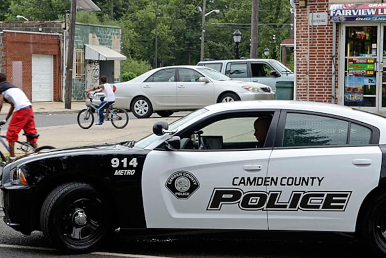 A Camden County police officer makes a stop in Fairview in 2013. Camden will fall off the City Crime Rankings list when the publisher releases its new ratings early next year.