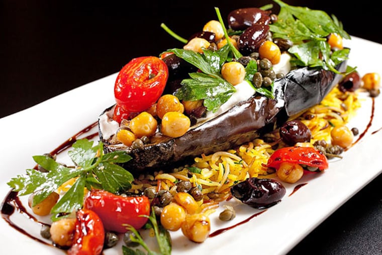 Char-roasted eggplant with olives, grape tomatoes, capers and oregano at Park Plates.