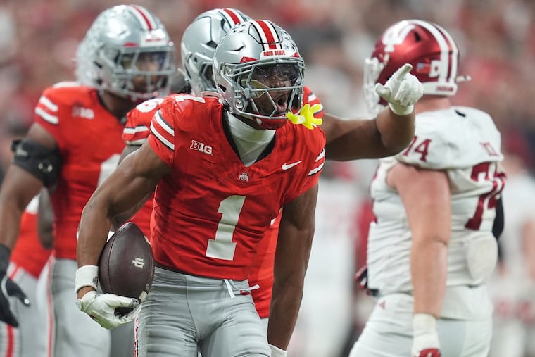 Ohio State's Davison Igbinosun celebrates after his interception in the Big Ten title game on Dec. 5. Might he be a Day 2 target for the Birds?