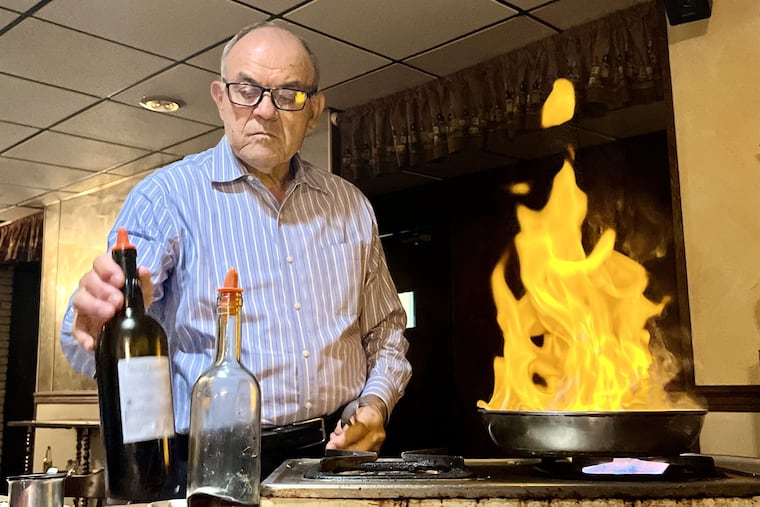 Owner Michael Galasso cooks a steak tableside at Michael's Restaurant, 935 Lincoln Highway, Morrisville, on Sept. 21, 2024.