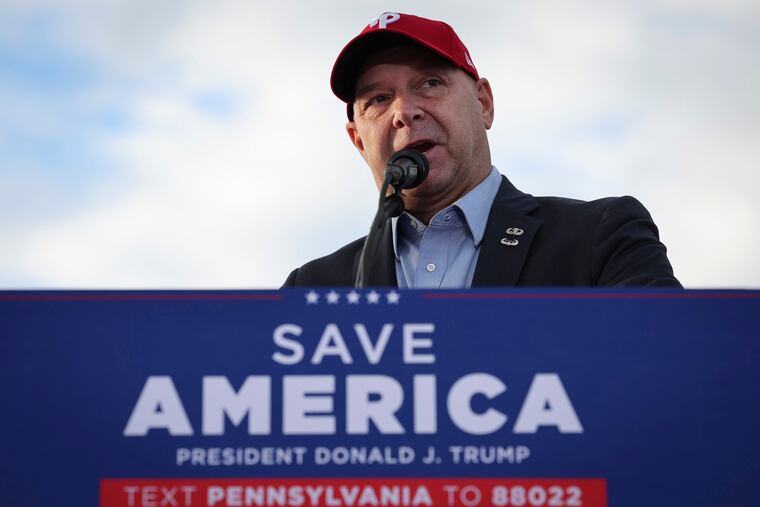 Doug Mastriano speaks during a rally featuring former President Donald Trump in Latrobe, Westmoreland County, shortly before Election Day.