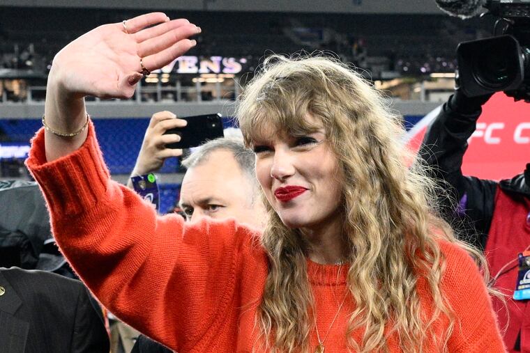 Taylor Swift waves after the AFC Championship NFL football game between the Baltimore Ravens and the Kansas City Chiefs on Sunday in Baltimore.