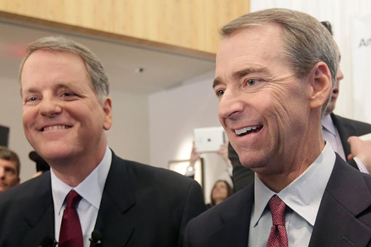 FILE - American Airlines CEO Tom Horton, right, and U.S. Airways CEO
Doug Parker, left, visit with employees after a news conference at DFW
International Airport in a Thursday, Feb. 14, 2013 file photo, in
Grapevine, Texas. The two airlines will merge forming the world's
largest airlines. Horton won't get to lead the new American Airlines
after it merges with US Airways, but he'll get a going-away prize of
nearly $20 million. American's parent company, AMR Corp., disclosed
the CEO's severance package in a regulatory filing. Horton will get
$9.94 million in cash and an equal amount in stock in the new company
after the merger. (AP Photo/LM Otero, File)