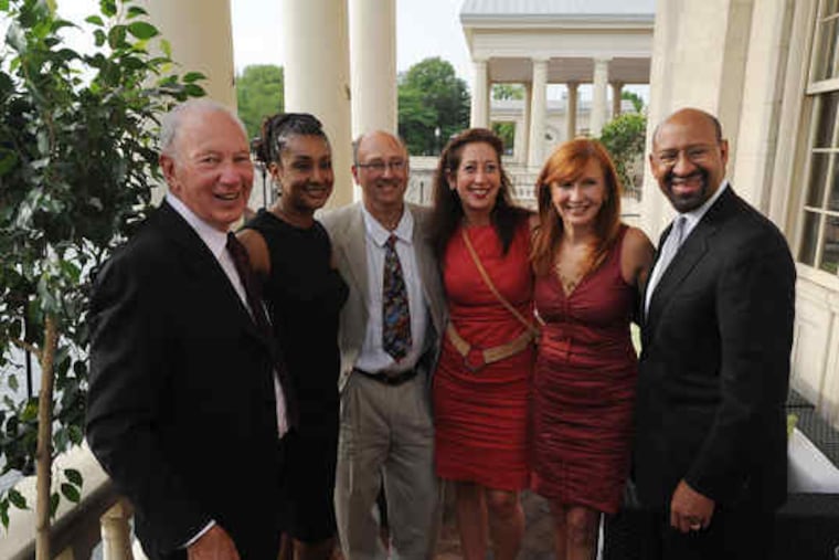 From left, Bud Konheim, chief executive officer of Nicole Miller; Lisa Nutter, president of Philadelphia Academies Inc.; Erik Neumann and his wife Mary Dougherty, owner of Nicole Miller of Philadelphia; designer Nicole Miller; and Mayor Nutter.