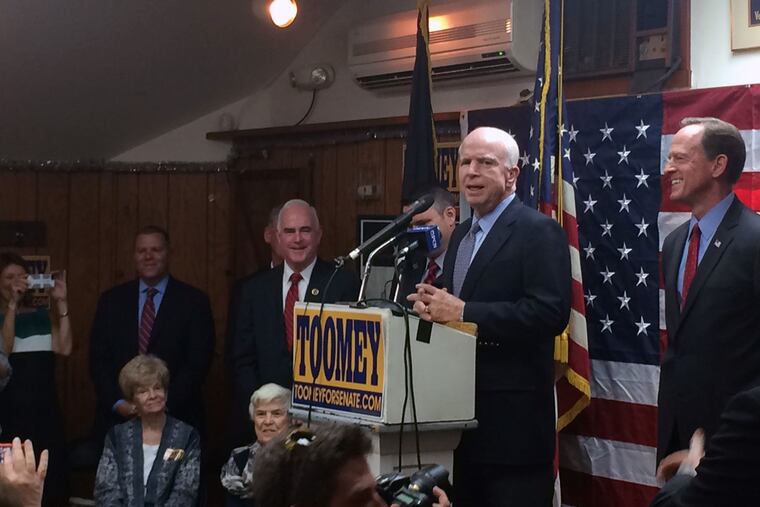 Sen. John McCain (R., Ariz) and Pat Toomey campaign together Friday before about 100 friendly supporters at the Folsom Veterans of Foreign Wars post.
