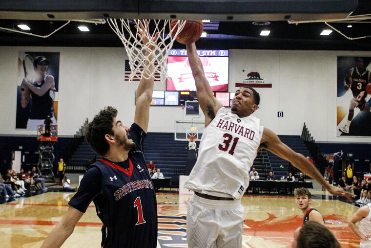 Seth Towns (right), returns after a player-of-the-year season to try to lead the Crimson to the Big Dance.
