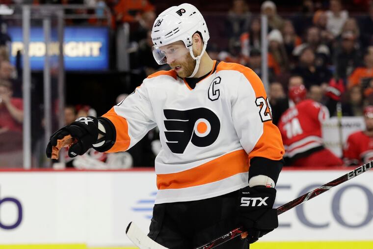 Flyers center Claude Giroux point to the ice against the Carolina Hurricanes on Thursday, January 3, 2019 in Philadelphia.