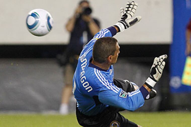 Union goalie Faryd Mondragon couldn't stop two Real Madrid goals in the game's first 10 minutes. (Ron Cortes/Staff Photographer)