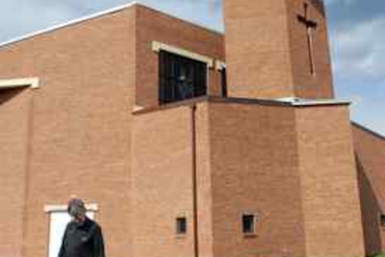 The sculpture will appear to float in front of the tower's cross at St. Martin of Tours. The New Hope church hopes to convey Jesus' strength, says the Rev. Frederick Kindon, walking his dog there.