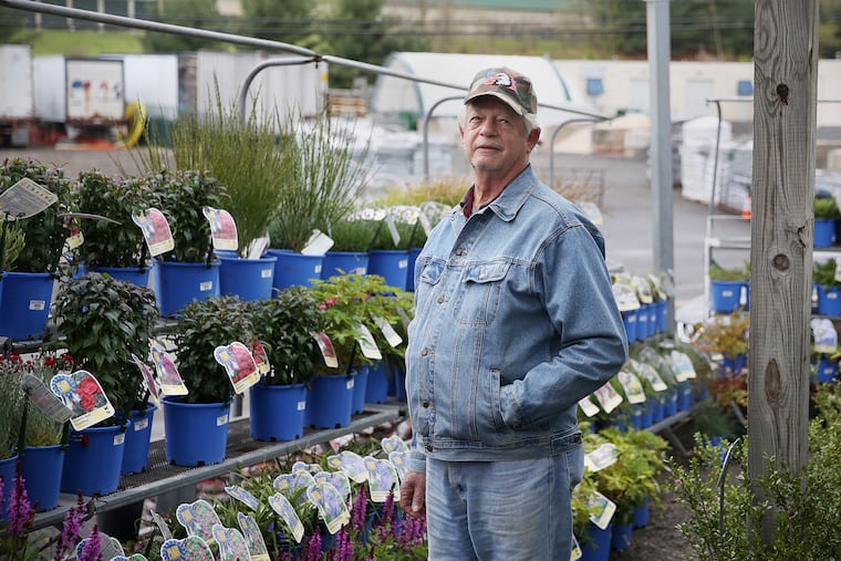 Delivery driver Dan Owarzani stands at Castle Garden Center in Lower Southampton Township.