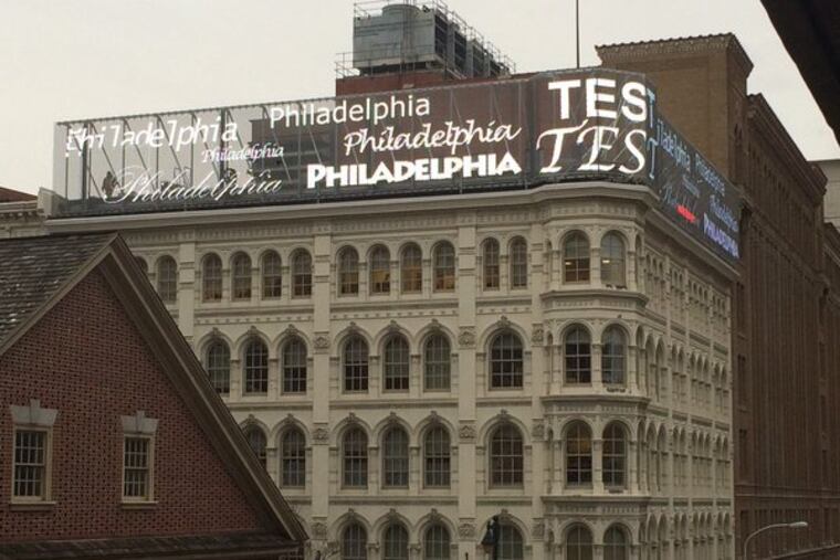 Testing begins Jan, 9, 2015, for electronic sign above the former Lit Brothers Building.