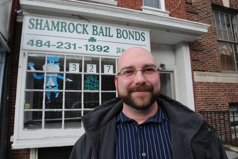 "The one thing you can always count on with the holidays: People want to get home to their families," said Brent Walls, shown outside his Shamrock Bail Bonds in Norristown