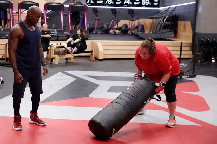 On the season opener of "The Biggest Loser," trainer Dolvett Quince works with contestant Jacquelyne Kmet of Hainesport, N.J.