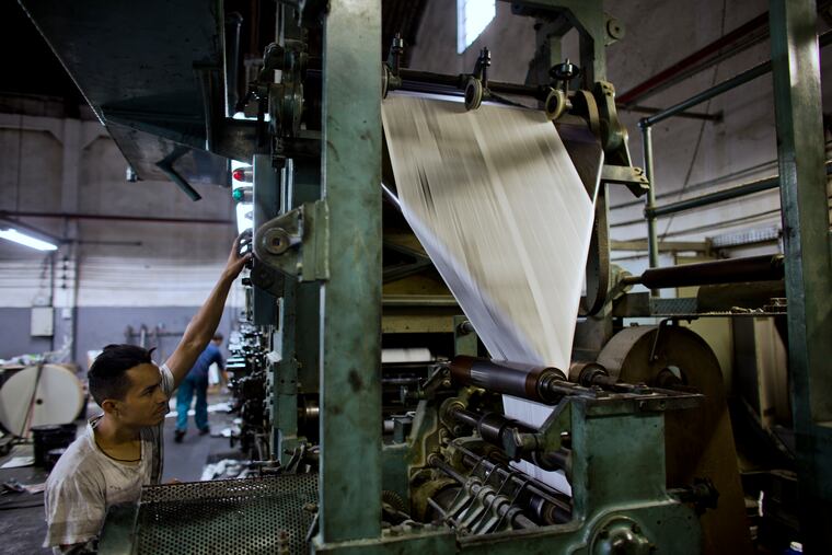 File Photo: A newspaper printing press.