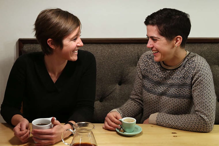 April Nett, left, and Elysa DiMauro, right, owners Menagerie Coffee inside their shop in the Old City section of Philadelphia on November 20, 2014. ( DAVID MAIALETTI / Staff Photographer )