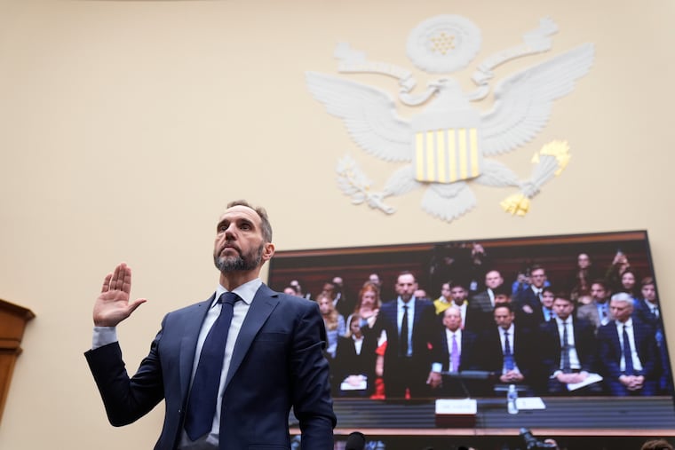 Former Justice Department special counsel Jack Smith takes an oath before the House Judiciary Committee at the Capitol in Washington on Thursday.