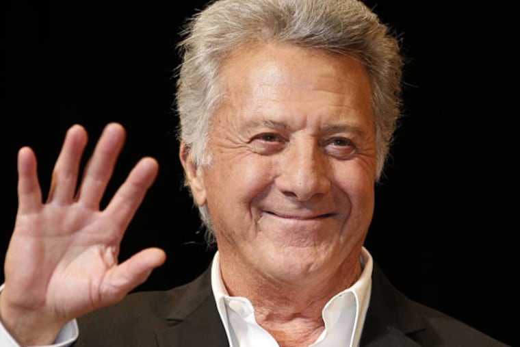 FILE - In this April 8, 2013 file photo, actor Dustin Hoffman waves to fans during the Japan Premiere of his film, "Quartet," in Tokyo. A spokeswoman for the 75-year-old actor-director confirmed a People.com report Tuesday, Aug. 6, 2013, that says Hoffman is in good health after undergoing surgical treatment for cancer. (AP Photo/Koji Sasahara, File)