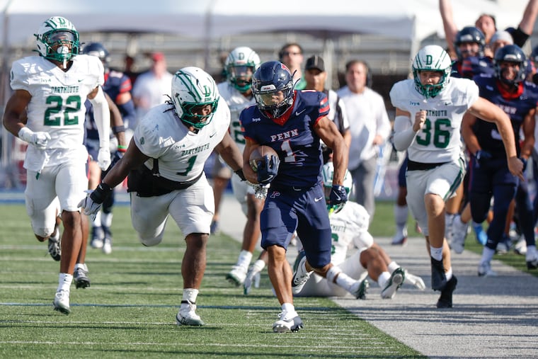 Penn returner Julien Stokes takes off on a 65-yard fourth-quarter punt return against Dartmouth on Saturday.