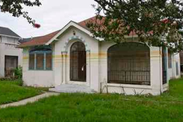 A house in the Lakeview section of New Orleans still bears the waterline left by flooding that followed Hurricane Katrina in 2005.