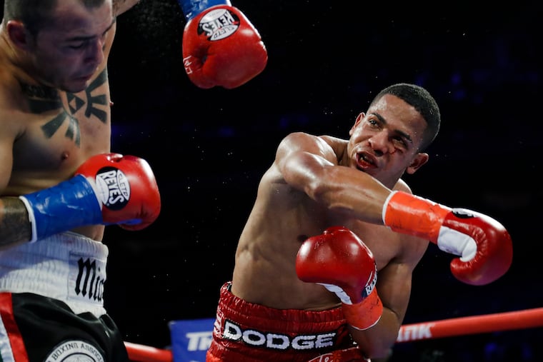 In this April 20, 2019 photo, Puerto Rico's Felix Verdejo, right, punched Costa Rica's Bryan Vazquez during the fifth round of a lightweight boxing match in New York.