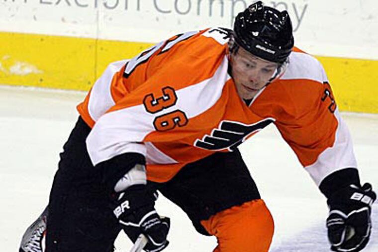 Center Darroll Powe, who was traded to Minnesota Monday, had seven goals and 10 assists last season. (Yong Kim/Staff file photo)