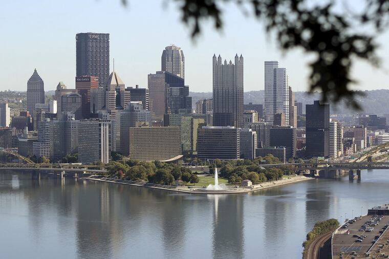The Pittsburgh skyline is seen from the West End Overlook, a city park. Amazon’s hubs, like the one in Pittsburgh, may be the more impactful expansion of Amazon.