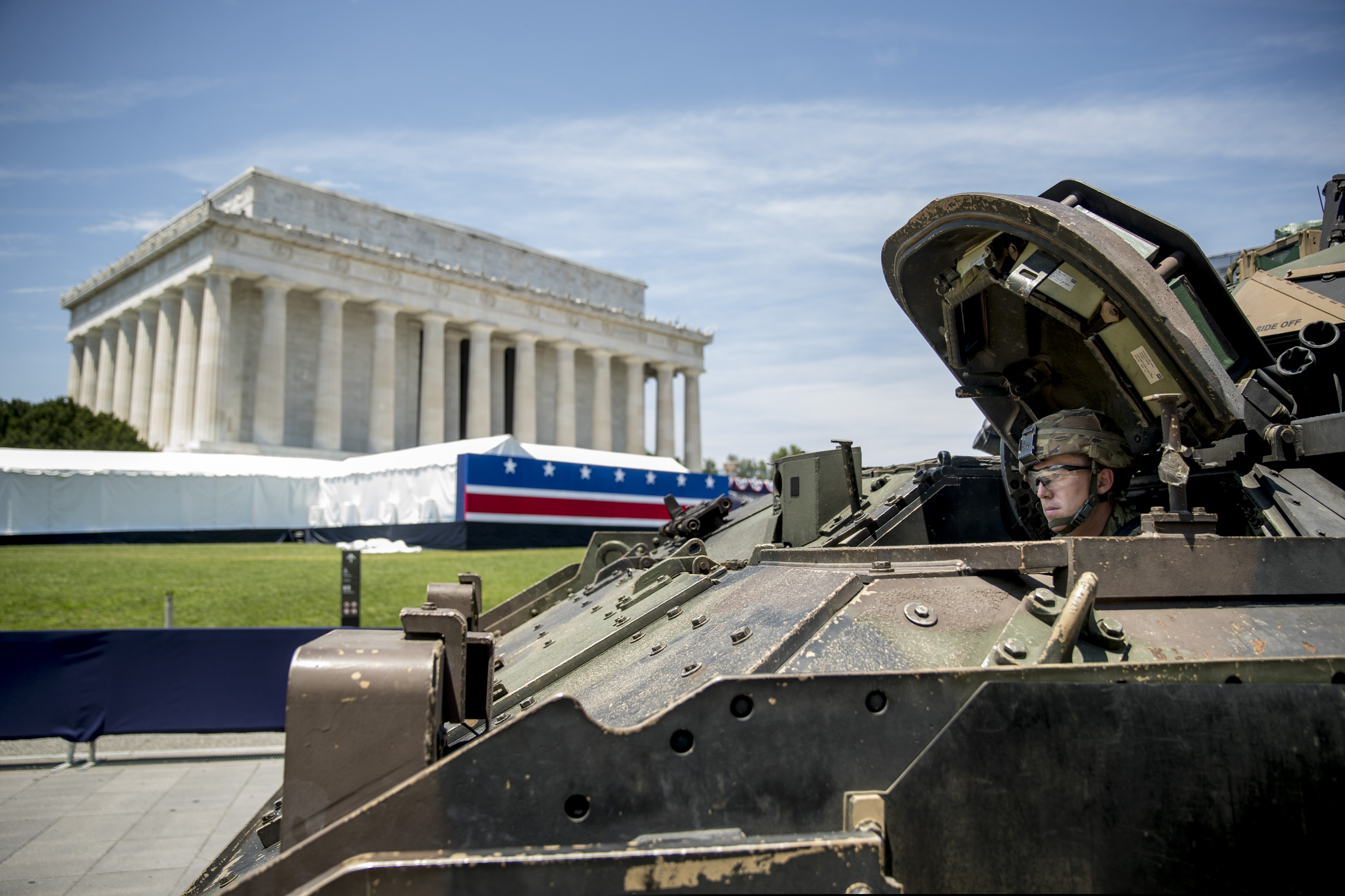 One of two Bradley Fighting Vehicles waits to be driven into place in front of the Lincoln Memorial for President Donald Trump's 'Salute to America' event honoring service branches on Independence Day, Wednesday, July 3, 2019, in Washington. President Donald Trump is promising military tanks along with "Incredible Flyovers & biggest ever Fireworks!" for the Fourth of July.