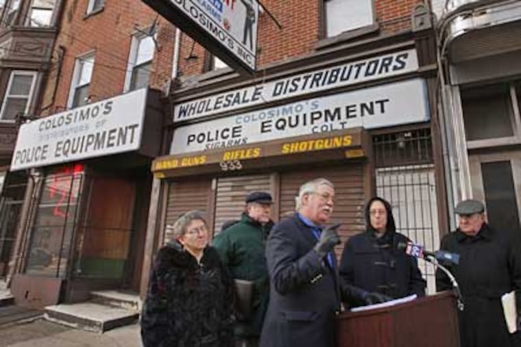 From left, Rabbi Linda Holtzman of Mishkan Shalom Synagogue, Thomas Swain, Clerk, Philadelphia Yearly Meeting of the Religious Society of Friends, Bryan Miller, executive director of Cease Fire New Jersey, The Rt. Reverend Allen L. Bartlett Jr., and Mrgr. Michael J. Carroll, of the Roman Catholic Archdiocese of Philadelphia, hold a press conference in front of Colosimo's gun center on Monday. (Michael S. Wirtz / Staff Photographer)