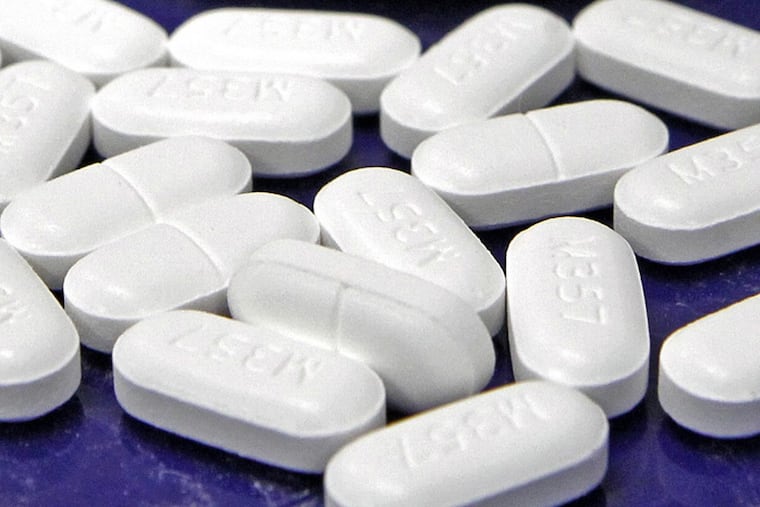 Hydrocodone-acetaminophen pills, also known as Vicodin, arranged for a photo at a pharmacy in Vermont.