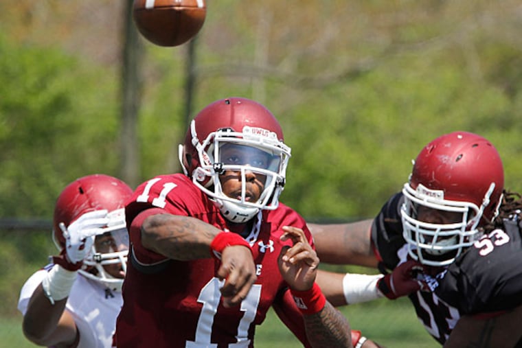 Temple quarterback P.J. Walker throws to a receiver. (Michael S. Wirtz/Staff Photographer)