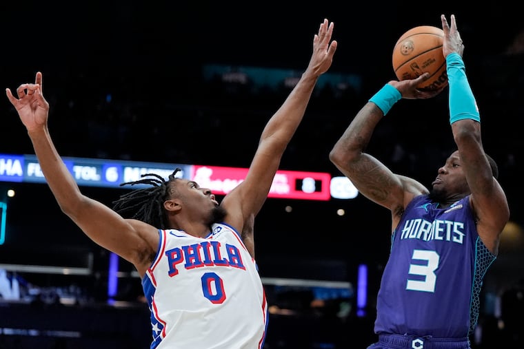 Hornets guard Terry Rozier shoots over 76ers guard Tyrese Maxey during the first half Saturday.