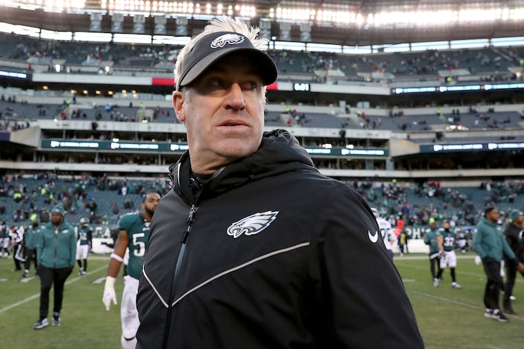 Eagles head coach Doug Pederson looks back as he walks off the field Sunday.
