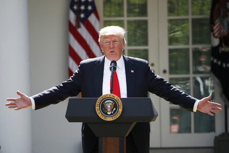 President Donald Trump speaks about the U.S. role in the Paris climate change accord, Thursday, June 1, 2017, in the Rose Garden of the White House in Washington. (AP Photo/Pablo Martinez Monsivais)