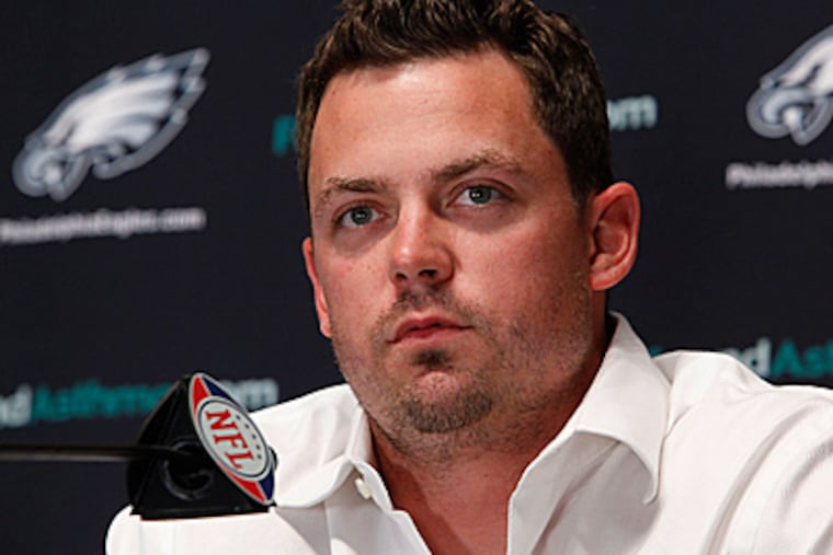 Kevin Kolb addresses the media during a news conference on Thursday after signing a one-year contract extension. (AP Photo/Matt Rourke)