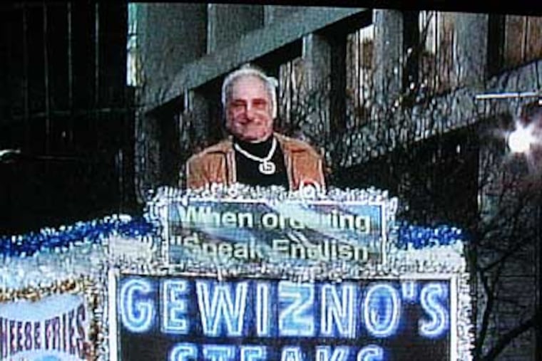 Joey Vento float in Mummers parade. Some were outraged by Joey Vento's Comic Brigade float, which featured immigrants knocking down fences. ( Steven M. Falk / Staff Photographer )