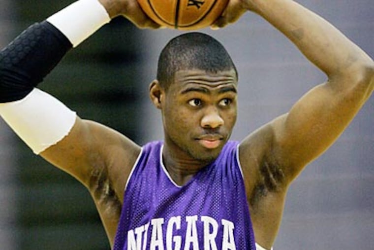 Tyrone Lewis decided to focus on basketball when he went to college. (David Duprey/AP file photo)