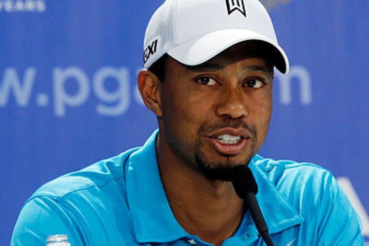 Tiger Woods remains the central figure at the PGA Championship. (John Bazemore/AP)