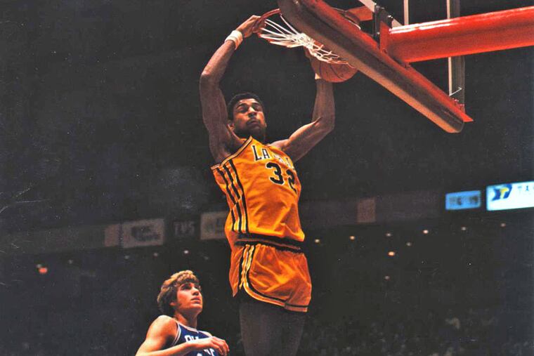 La Salle's Michael Brooks scores against Duke's Mike Gminski in a January 1978 game.