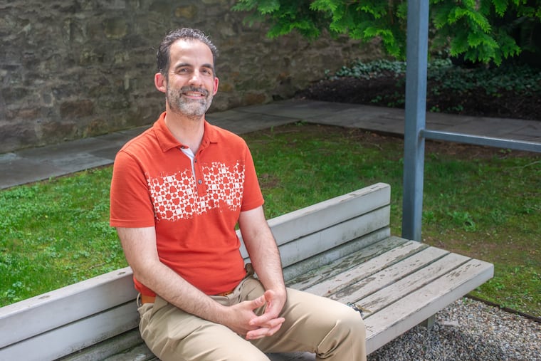While some teachers have banned AI, Brett Vogelsinger, an English teacher at Central Bucks South High School, asks kids to fill out "transparency surveys" that describe if and how they used the technology while writing. Vogelsinger is pictured outside the Michener Museum in Doylestown.