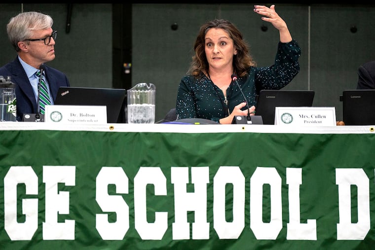 Board member Joan Cullen speaks at a board meeting in 2022. Cullen does not support the new curriculum.