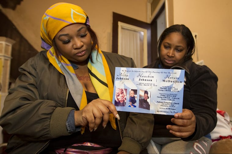Laleeha Cephas and her mother Trinell Cephas (right) holding the flyer made to inform people of her cousins’ deaths. The three died in a March 20 house fire in North Philadelphia.