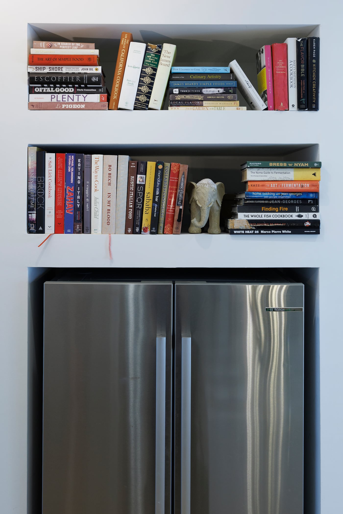 Calhoun has cookbooks tucked everywhere in his home, including in a nook above his fridge.