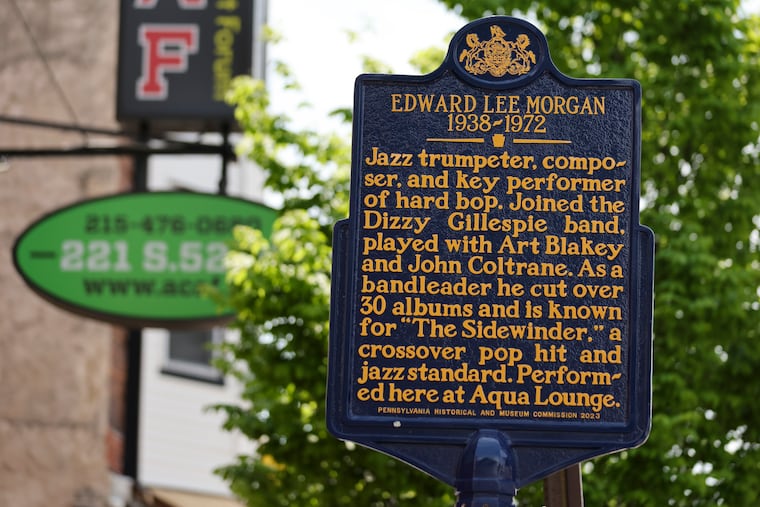 The historical marker honoring of jazz trumpeter Edward Lee Morgan is at the corner of 52nd and Chancellor Streets, outside of the now-defunct Aqua Lounge jazz club, in Philadelphia.