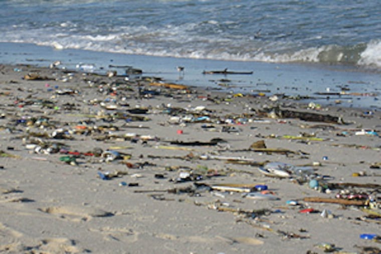 When the tide went out, the beach was left littered with waste.
